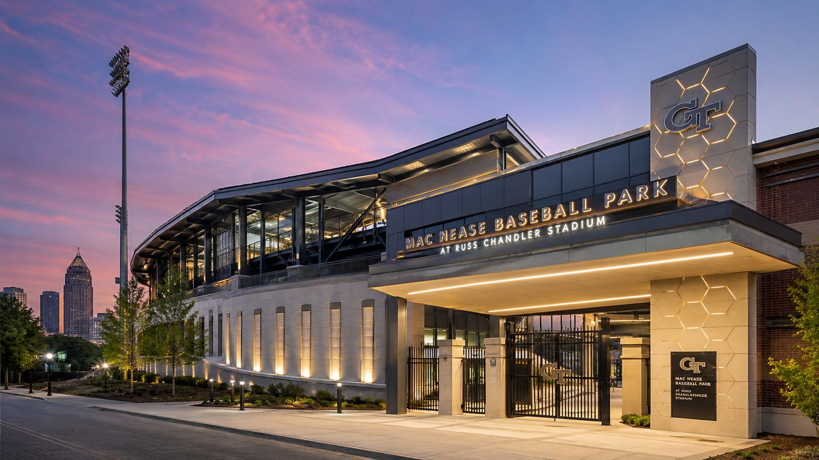 The exterior entrance of the Georgia Tech Mac Nease Baseball Park at Russ Chandler Stadium during sunset.