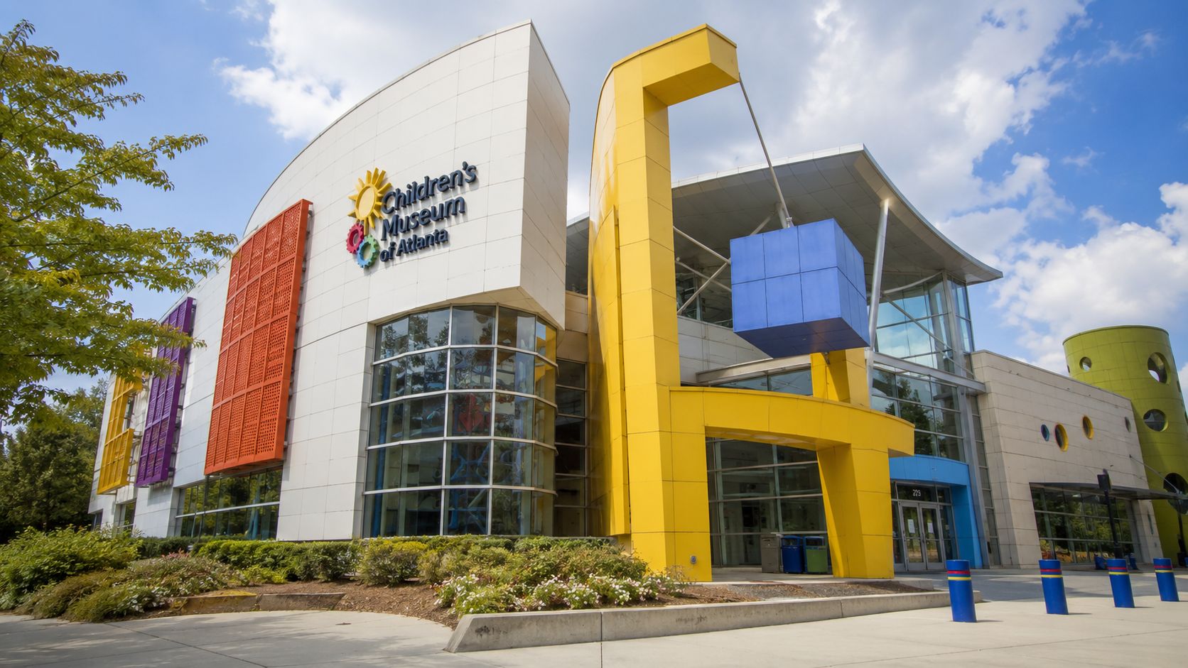 The colorful exterior of the Children's Museum of Atlanta on a bright sunny day with a blue sky.